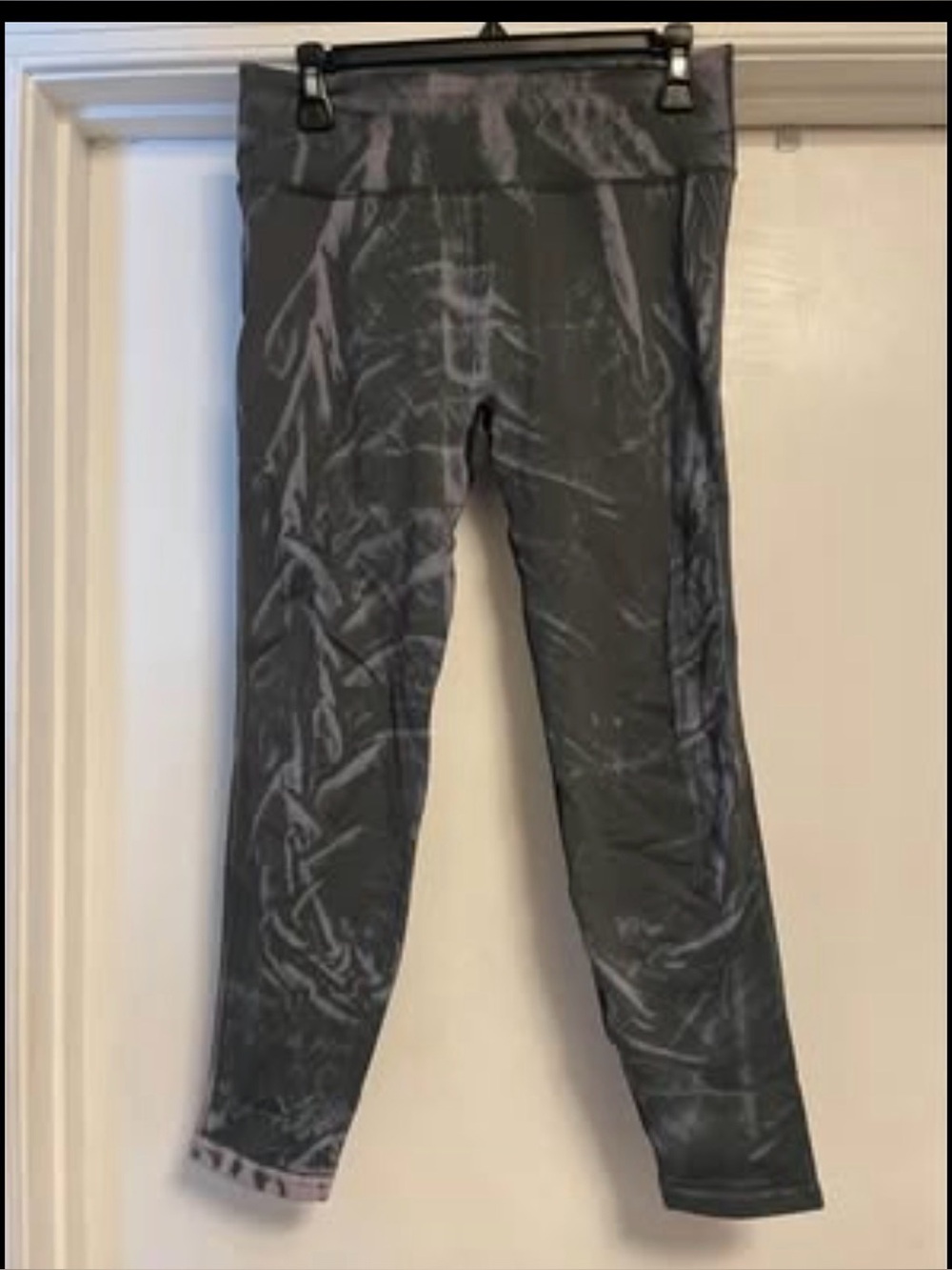 Lululemon Ebb to Street tights in a stone wash graphite grey tie-dye pattern